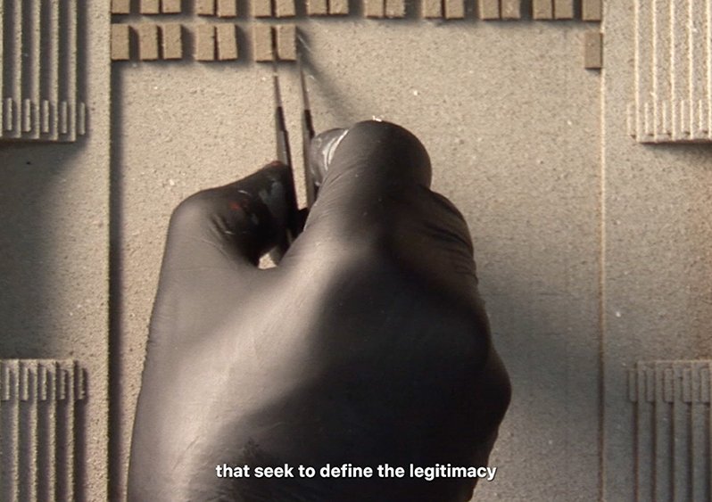 A sports hall located at the centre of Catanzaro Sud serves as a site for the extraction of data from asylum seekers. Still from Regime of Calculations (2023).