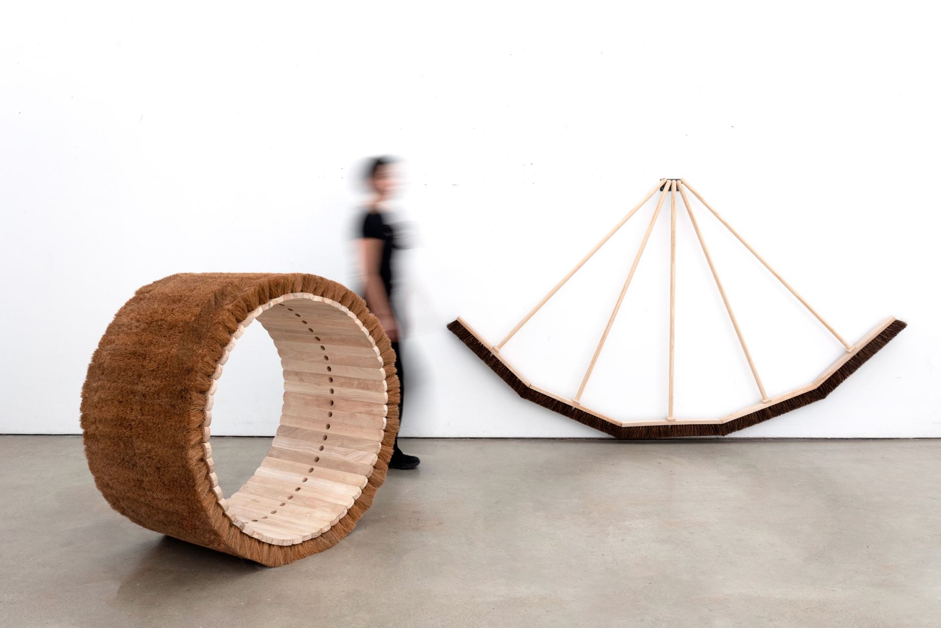 Ana María Chamucero Sweepers (2024 - 2025) Left: Wheel (2025), Right: Pendulum (2024) Assemblages with wooden brooms. Image taken at: Bridge Studio, RCA Battersea.