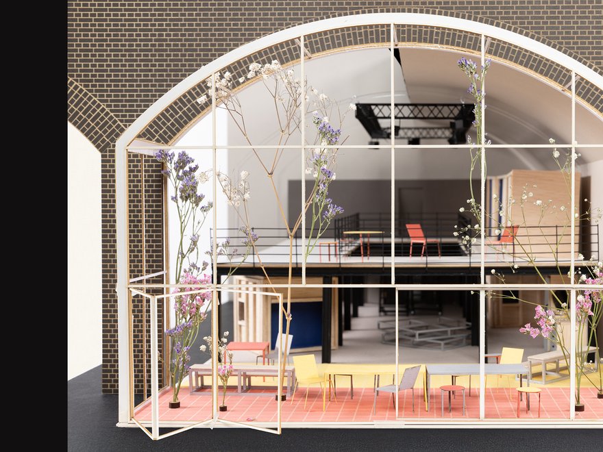 A detailed architectural model or diorama of a multi-level interior space.
