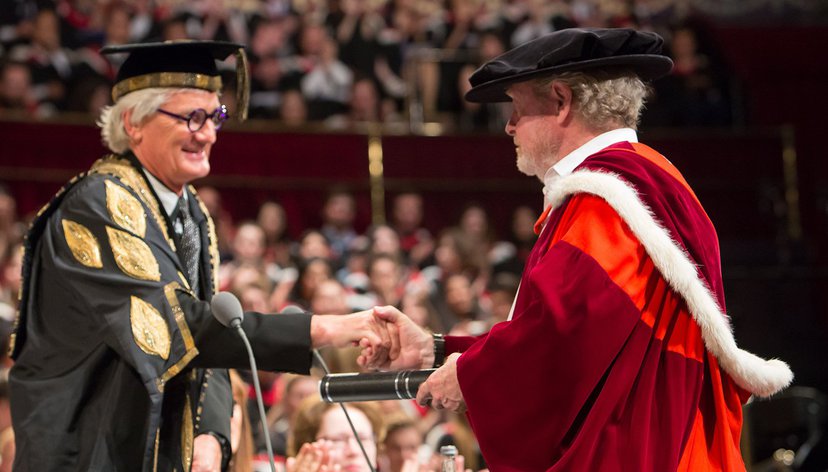 Sir Ridley Scott Receives his Honorary Doctorate from Provost Sir James Dyson at Convocation, 2015.