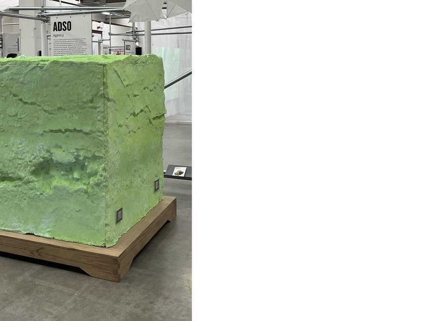 Installation view of a green cube