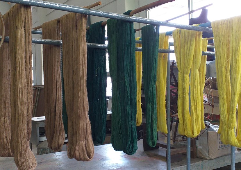 Dyed yarns drying in the workshop