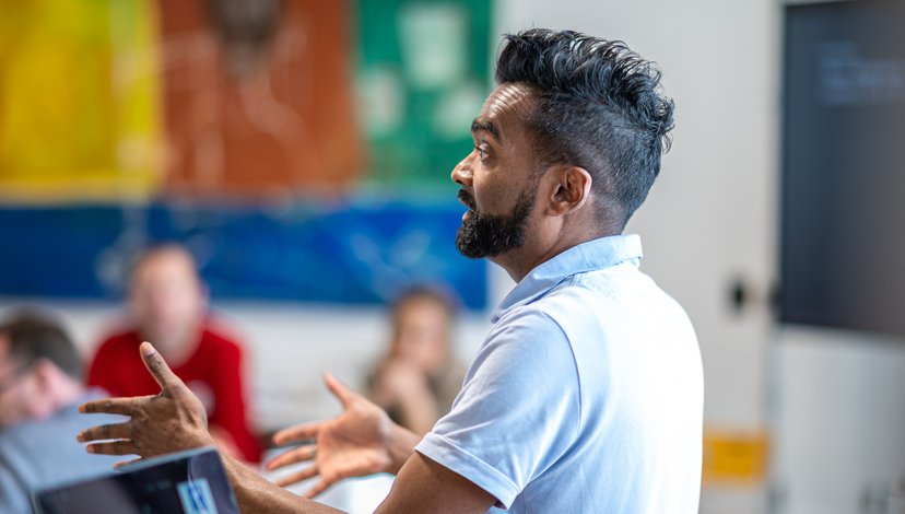 Rama Gheerawo presents to a classroom for a short course on Creative Leadership at the RCA