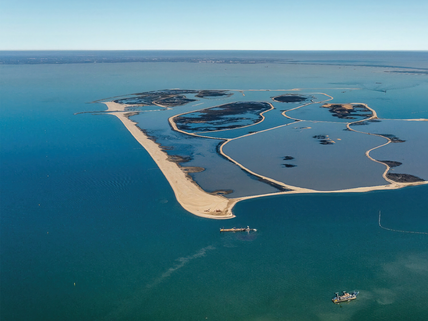 Aerial view of the Marker Wadden artificial archipelago in the Markermeer lake, Netherlands, showing multiple islands with varying shapes and water bodies.