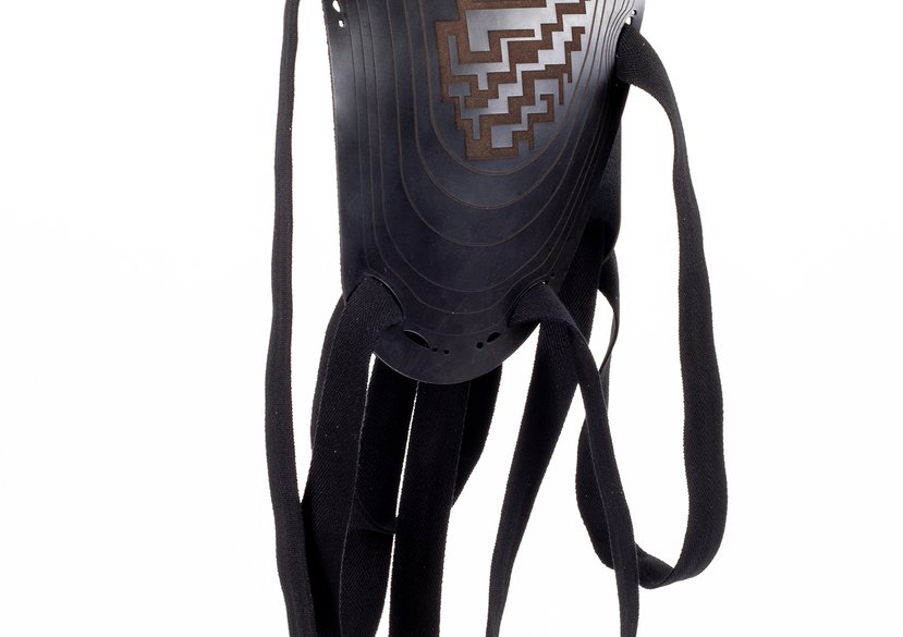 Laser machined leather shoulder piece