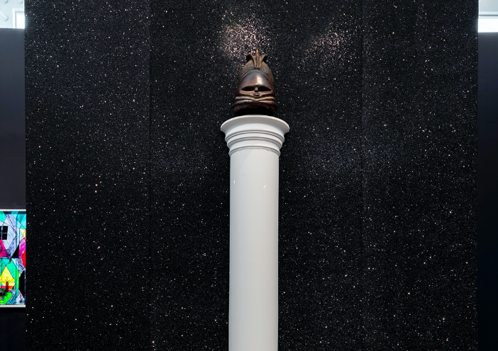 UnearTHings I & UnearTHings II, glitter fabric, polyurethane columns and found wooden masks