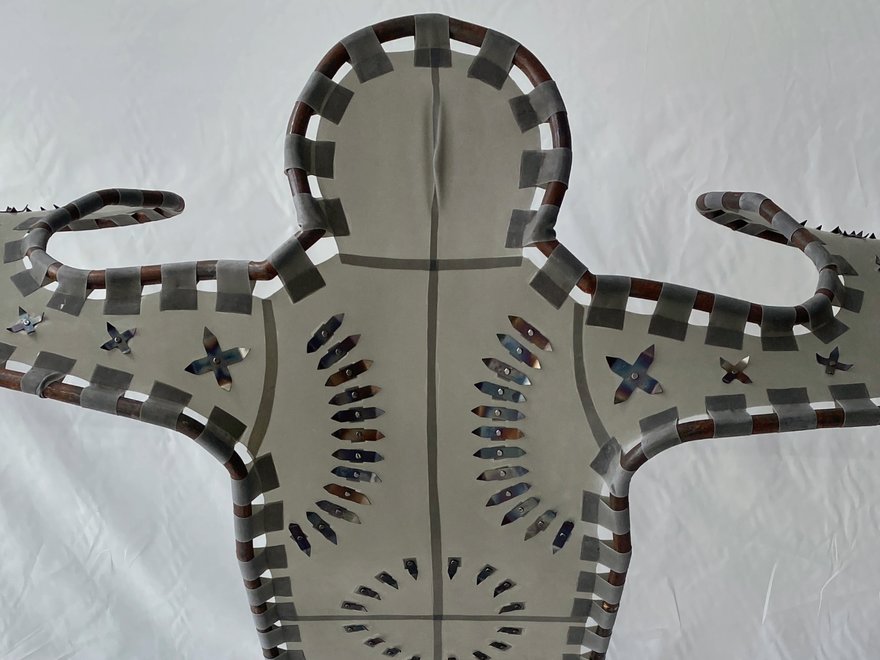 A futuristic outfit made of bamboo and stretched material