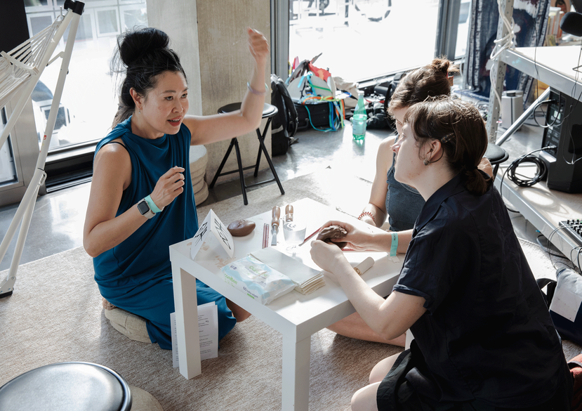 Lynn Lu, The Weight of raindrops, participatory durational performance at STATION with audience members wrapping their minor feelings in clay envelopes, presented as part of the Curating Contemporary Art (MA) Show, Royal College of Art, 2026. Photo: Lucy