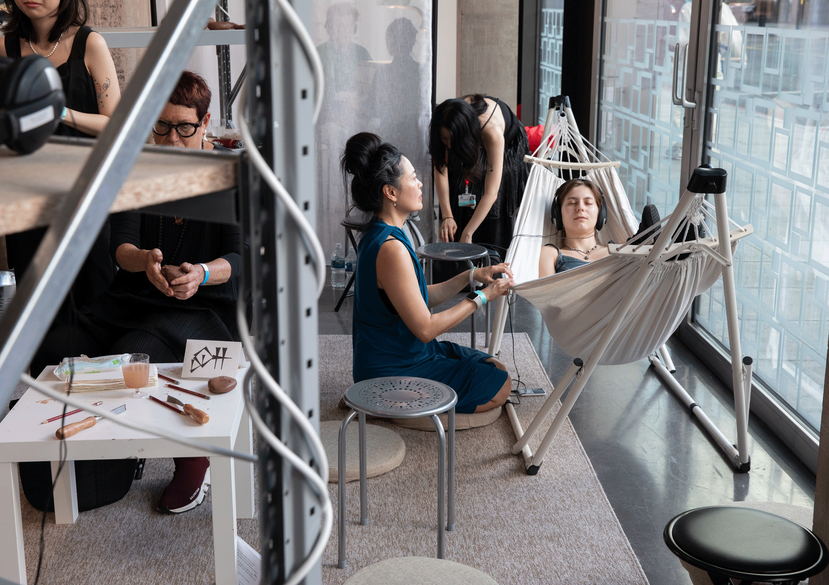 Caption: Lynn Lu, The Weight of raindrops, participatory durational performance offering audience members solaces in response to them sharing their minor feelings at STATION, presented as part of the Curating Contemporary Art (MA) Show, Royal College of A