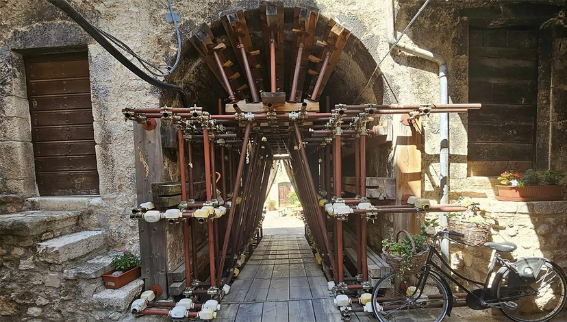 A vaulted street or passageway in the medieval village of Castelvecchio Calvisio, located in the Abruzzo region of Italy.