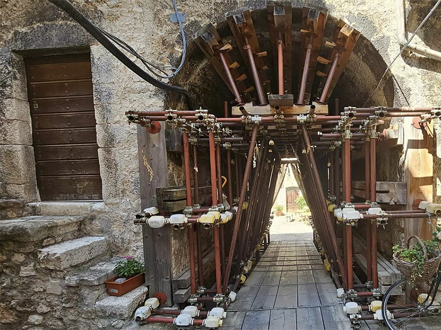 A vaulted street or passageway in the medieval village of Castelvecchio Calvisio, located in the Abruzzo region of Italy.