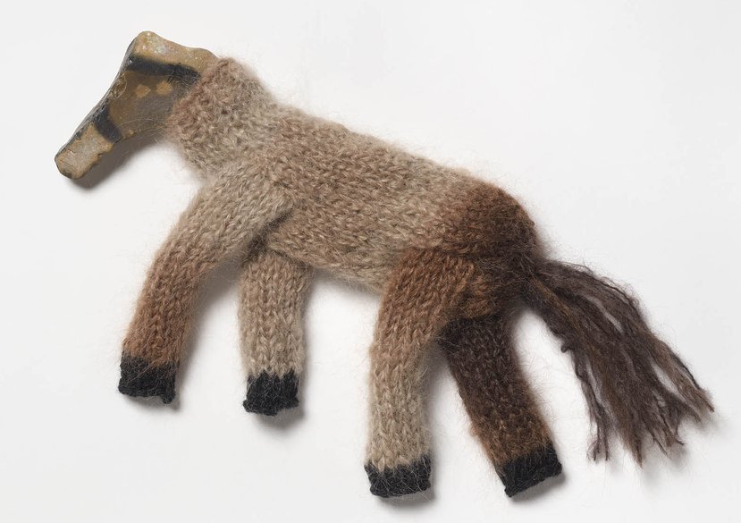 Hand knitted horse in brown and grey yarns