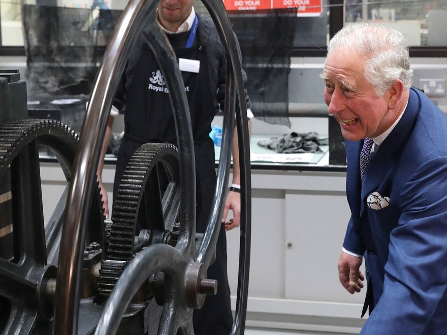 His Royal Highness The Prince of Wales creates a print with the 'Hockney Press'