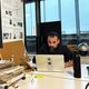 Monder Haraga at laptop in RCA workshops