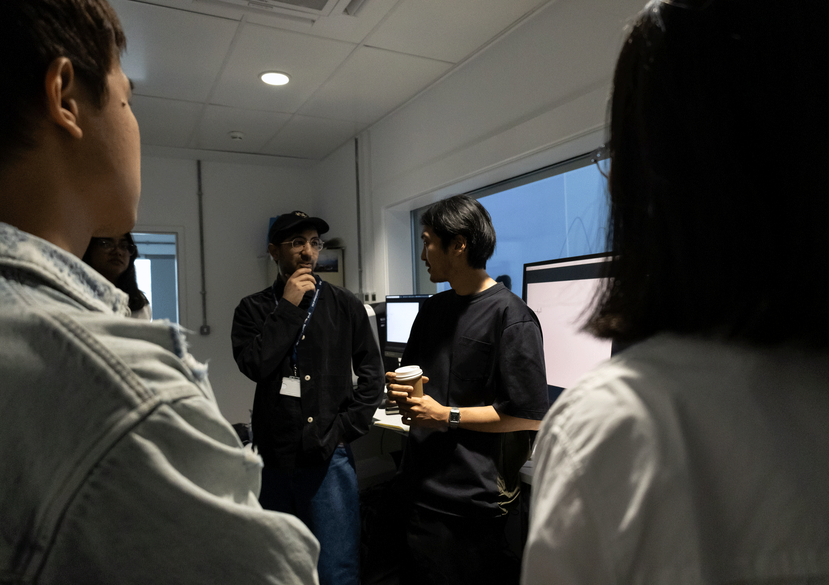Dr Ali Mohammed and Dr Freddie Hong in the control room of the Visualisation Lab curating the work. Photo: Vivaan Thongram