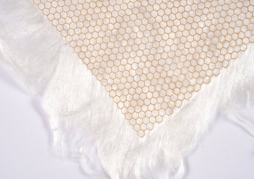 Nonwoven textile fabrication with regenerated cellulose obtained from post-consumer textiles