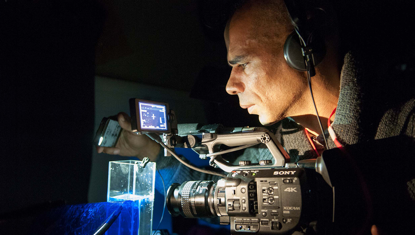 RCA PhD Candidate Wayne Binitie documenting Antarctic ice at the British Antarctic Survey (Credit - Pete Bucktrout, British Antarctic Survey).png