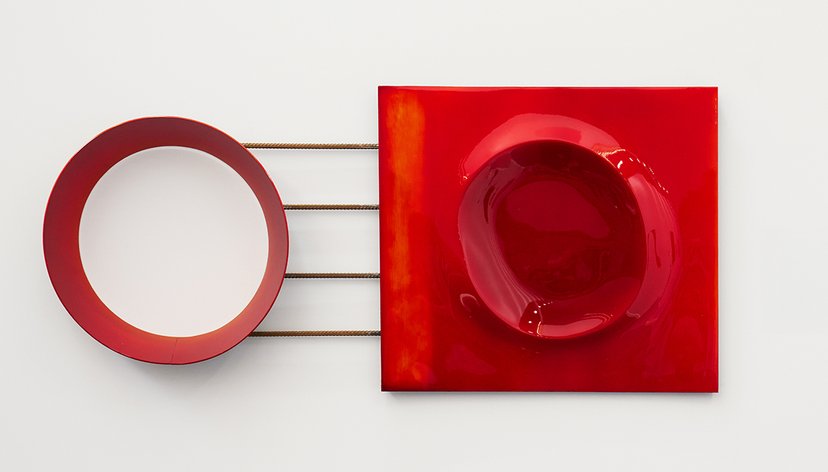 Modern sculptural work with layers of red luminous automotive paint on salvaged steel and aluminium
