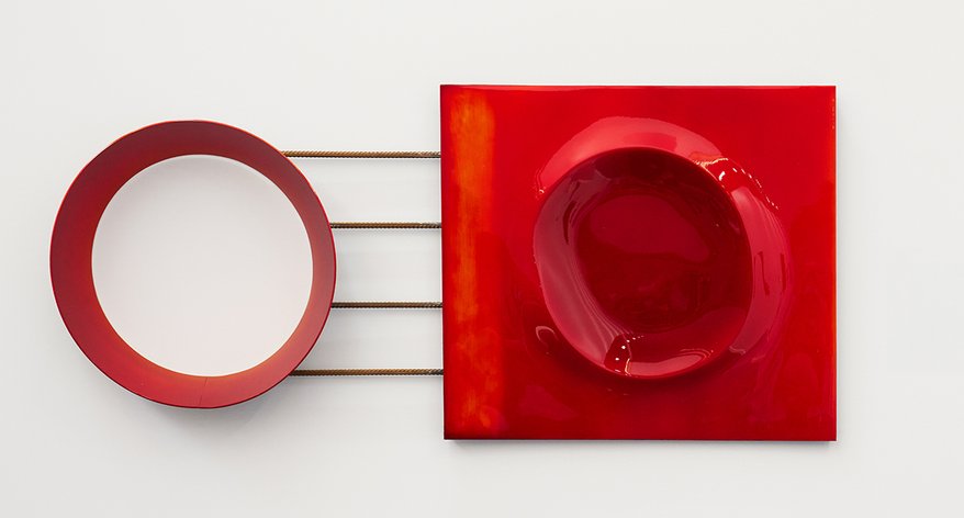 Modern sculptural work with layers of red luminous automotive paint on salvaged steel and aluminium