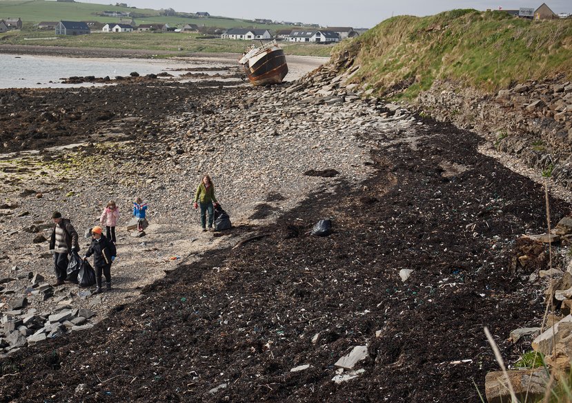 A beach cleaning event in April 2025 organised by Greener Orkney as part of the ‘Big Bruck’ initiative at the Fourth Barrier beach