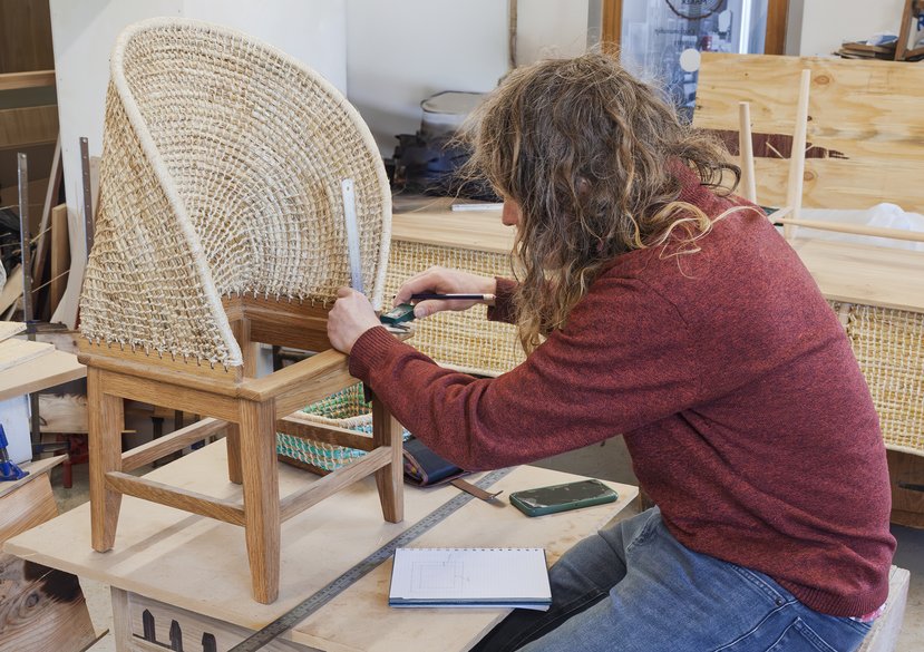 Joel Chaney (Tern360) with the prototype of the Orkney Ocean Chair at chairmaker Kevin Gauld’s workshop