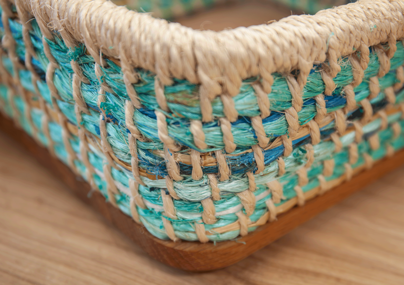 A sample of the woven back for the Ocean Orkney Chair made by Kevin Gauld from discarded rope found on a local beach.