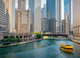 The Chicago river, flanked by skyscrapers