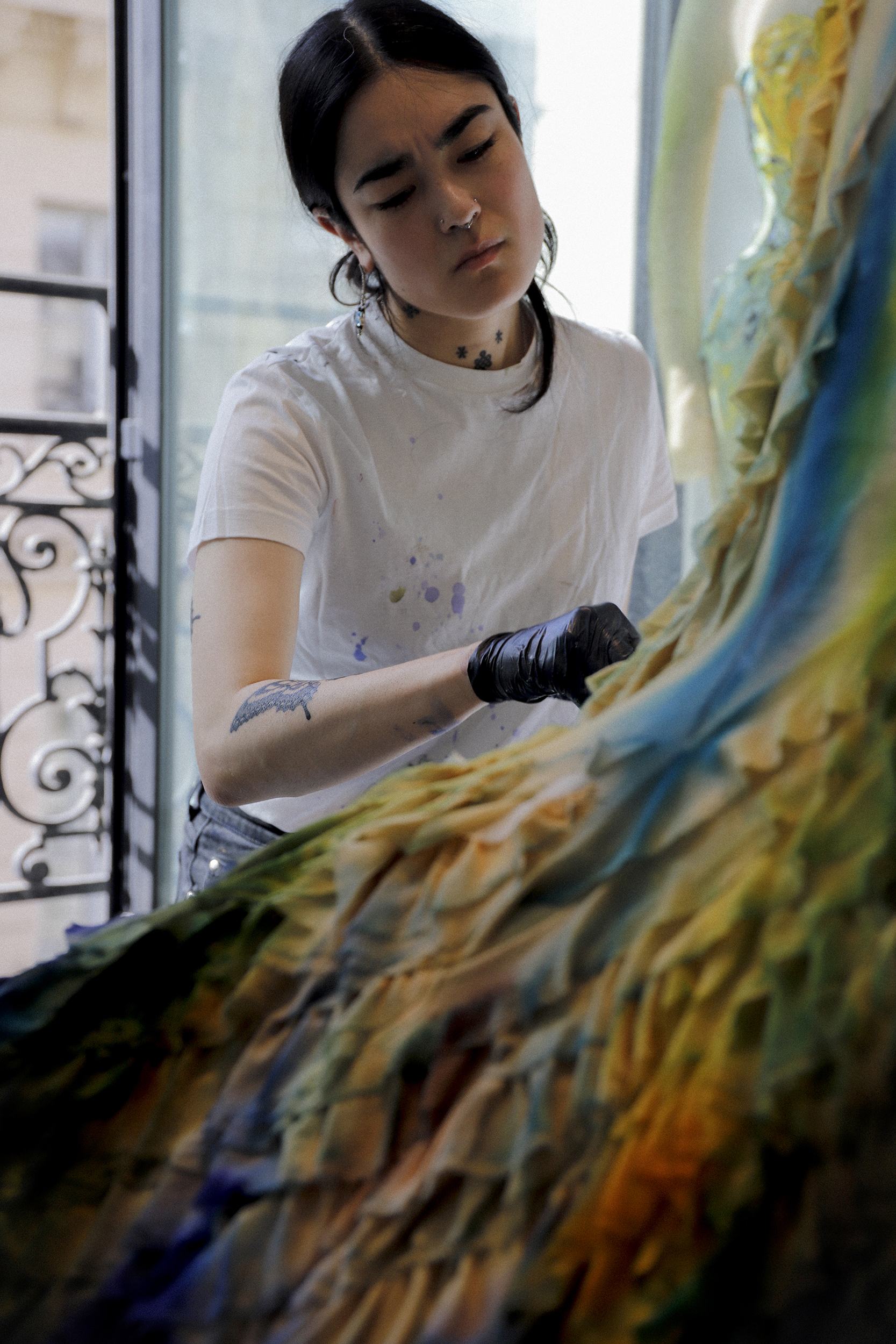 Anna Deller-Yee working on the Mugler dress worn at Met Gala by Emma Chamberlain