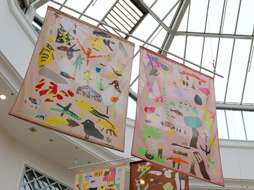 Our Beautiful Neighbourhood Banners hanging from ceiling