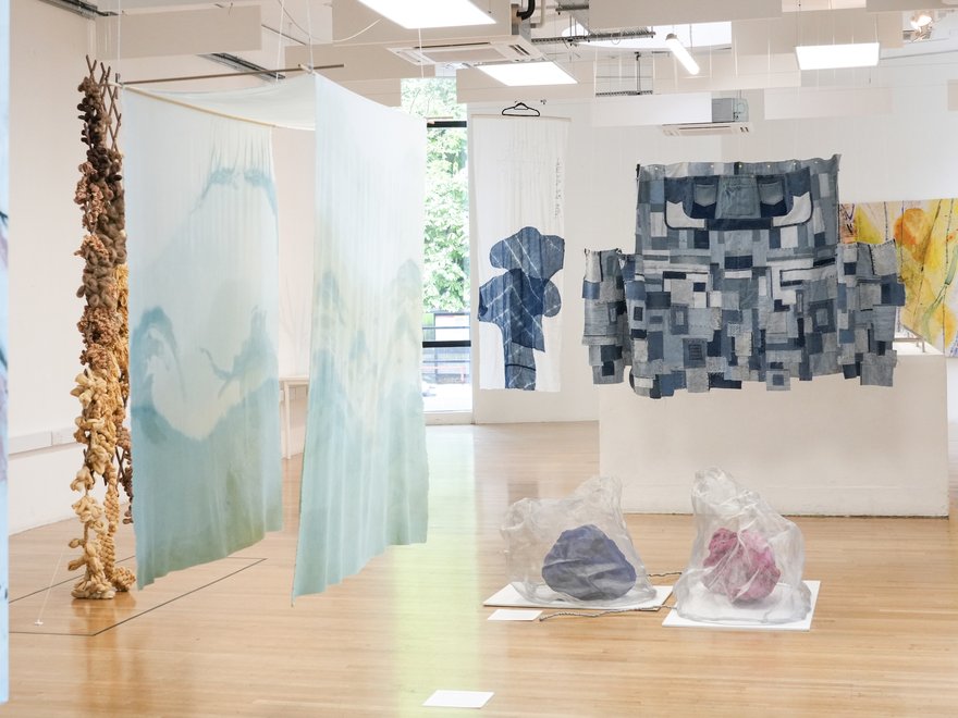 Multiple works of art hanging in the RCA's Gulbenkian gallery space.