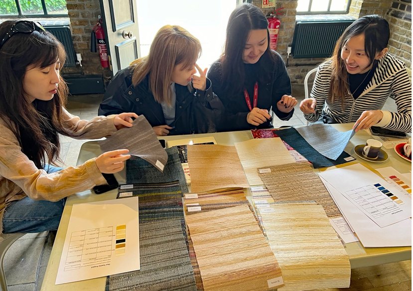 RCA students at a Thai Textiles sample handling workshop