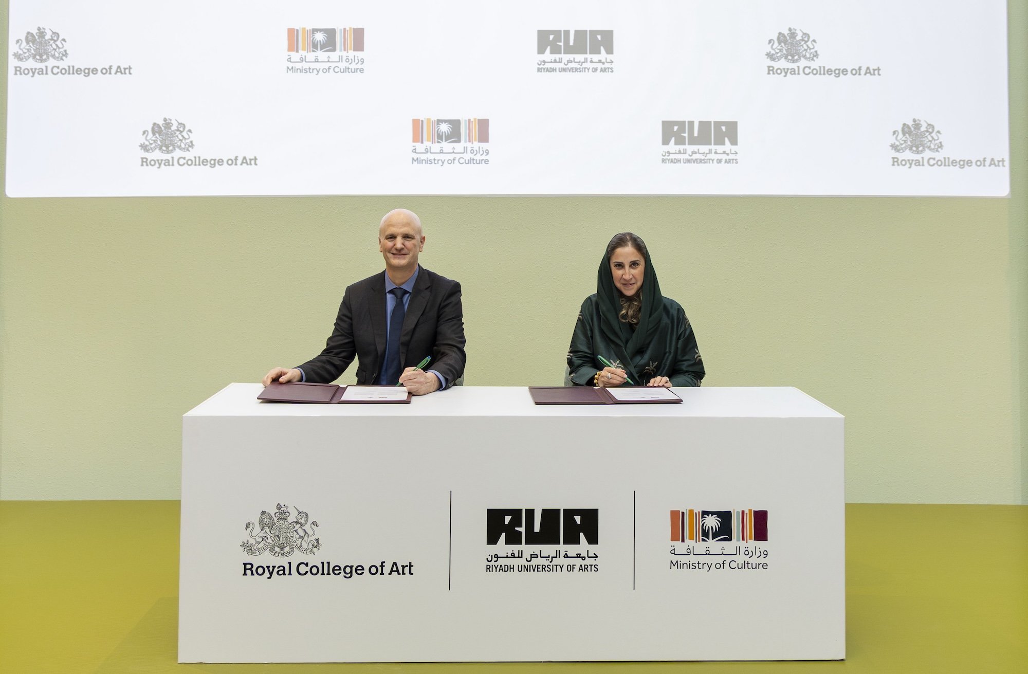 Professor Christoph Lindner & Ms Noha Kattan at a signing ceremony for the agreement