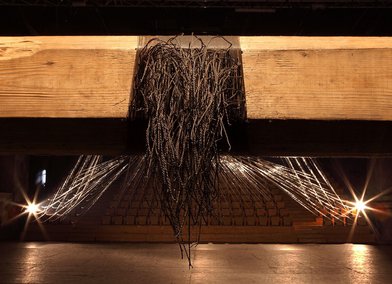 Traino (Townline), 2014–15, intervention at the Cavallerizza Real, Turin, Italy, Santiago Reyes Villaveces Steel wire, wood beam and chairs 50mx50m