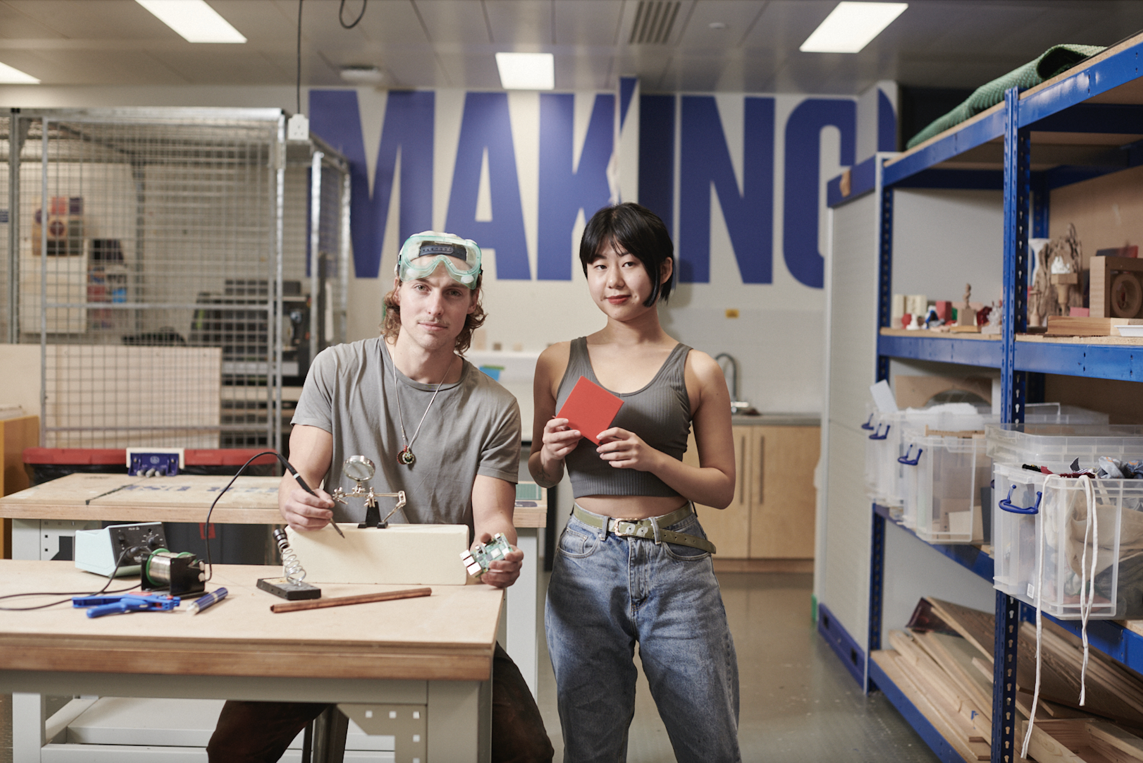 Students soldering in workshop