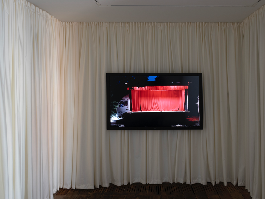 A room with a TV screen