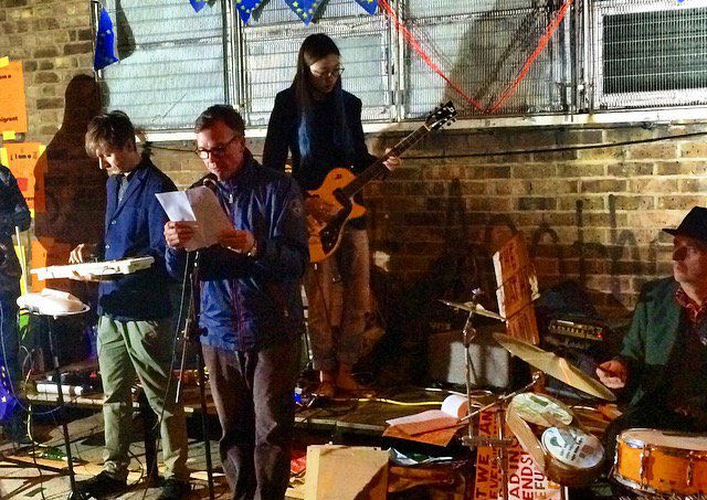 Slyce reading his text: ‘No Fun W/O EU’ with Bob and Roberta Smith and the Apathy Band