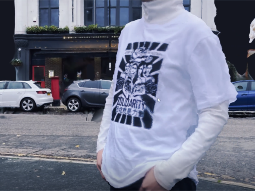 A man wears a t-shirt for China Palestine Solidarity Society