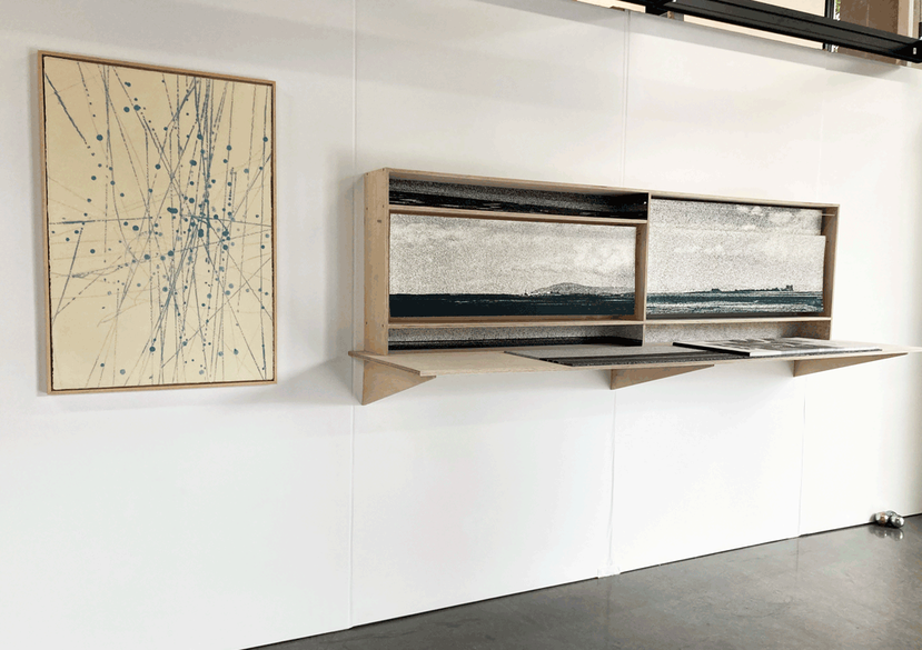 Detail of installation 'The Atomic Divide: Swords and Ploughshares'. Screenprint, letterpress, handmade books, bookshelf.