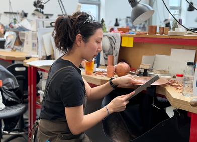 Working at the bench in the RCA metal workshop