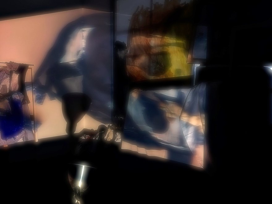 Projected, abstract images in a dark space.