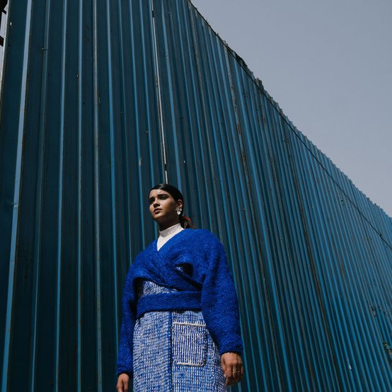 Uroos Jamal's overcoat design